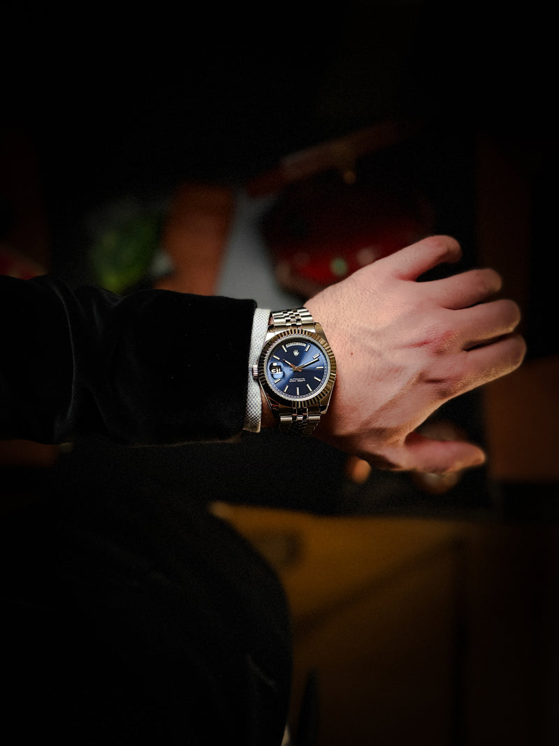 Lifestyle shot of the Valenne Destro steel watch worn comfortably on the wrist, showing the 9 o'clock crown.