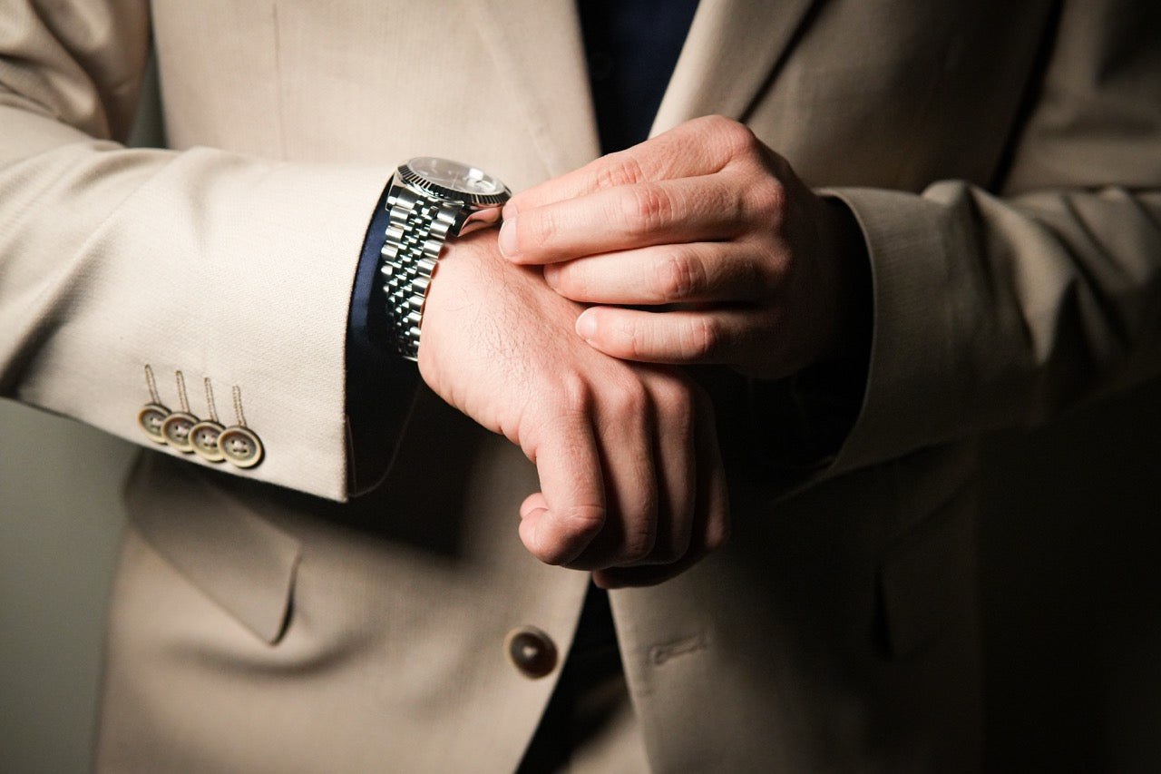 Valenne 9 o'clock crown watch worn on the left wrist, showing comfort with the crown facing safely away from the hand.