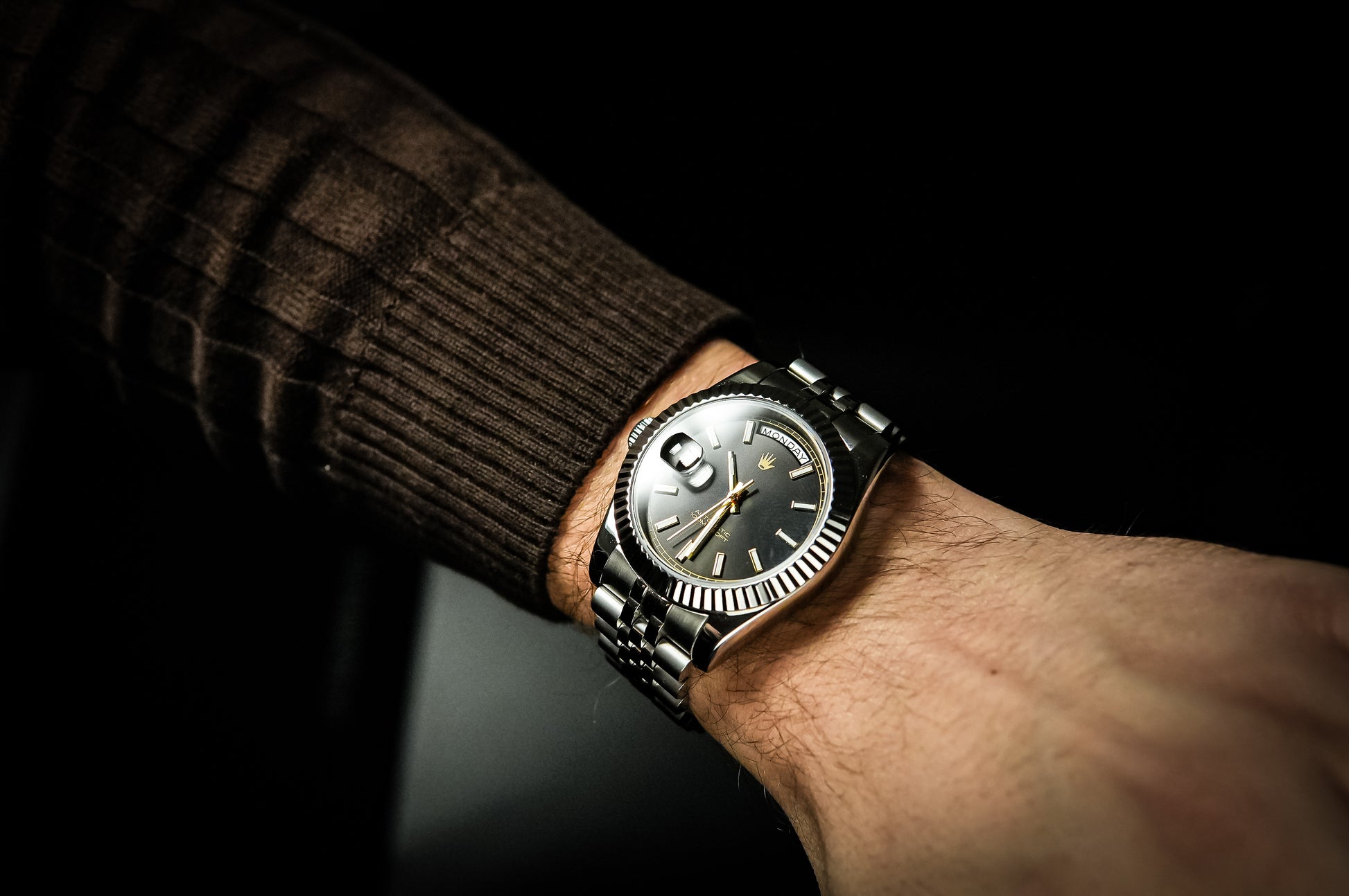 Professional studio shot of the Valenne destro watch in stainless steel featuring a black sunburst dial.